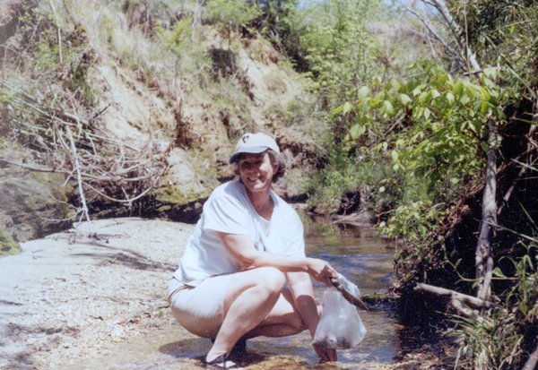 Ann collecting in creek