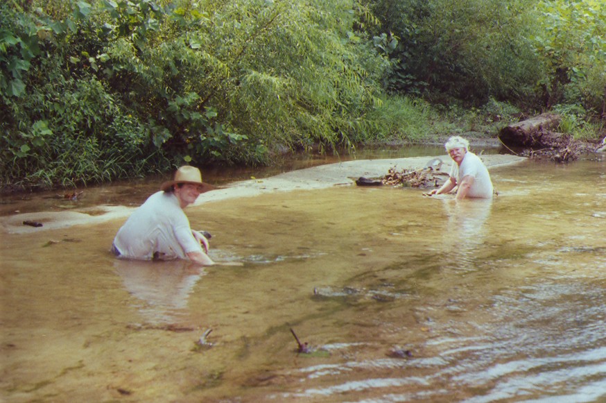 collecting fossils in the creek