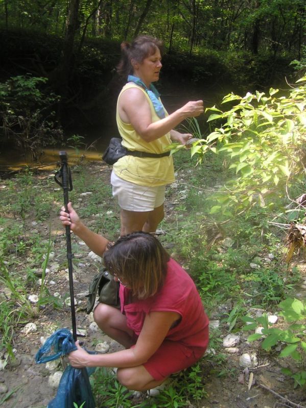 Michelle and Becky hunt fossils at the creek