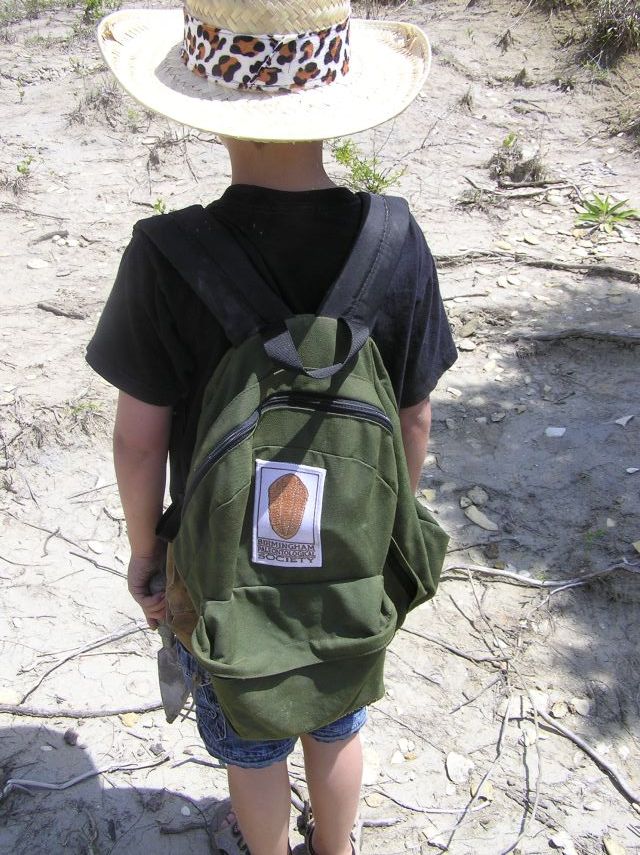 bps logo with fossil trilobite image on backpack