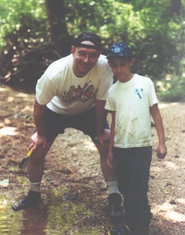 Brian and son in creek