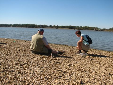 sitting by lake