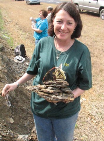 Donna with fossil slabs