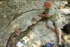 Greg excavating bone from Eotrachodon orientalis dinosaur