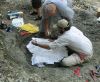 Greg and James making the plaster jacket for the skull of Eotrachodon orientalis dinosaur
